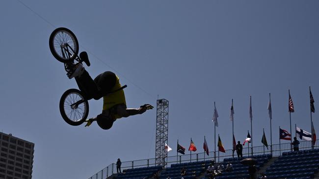 Australia's Logan Martin shows off his talent with the stand in the background.