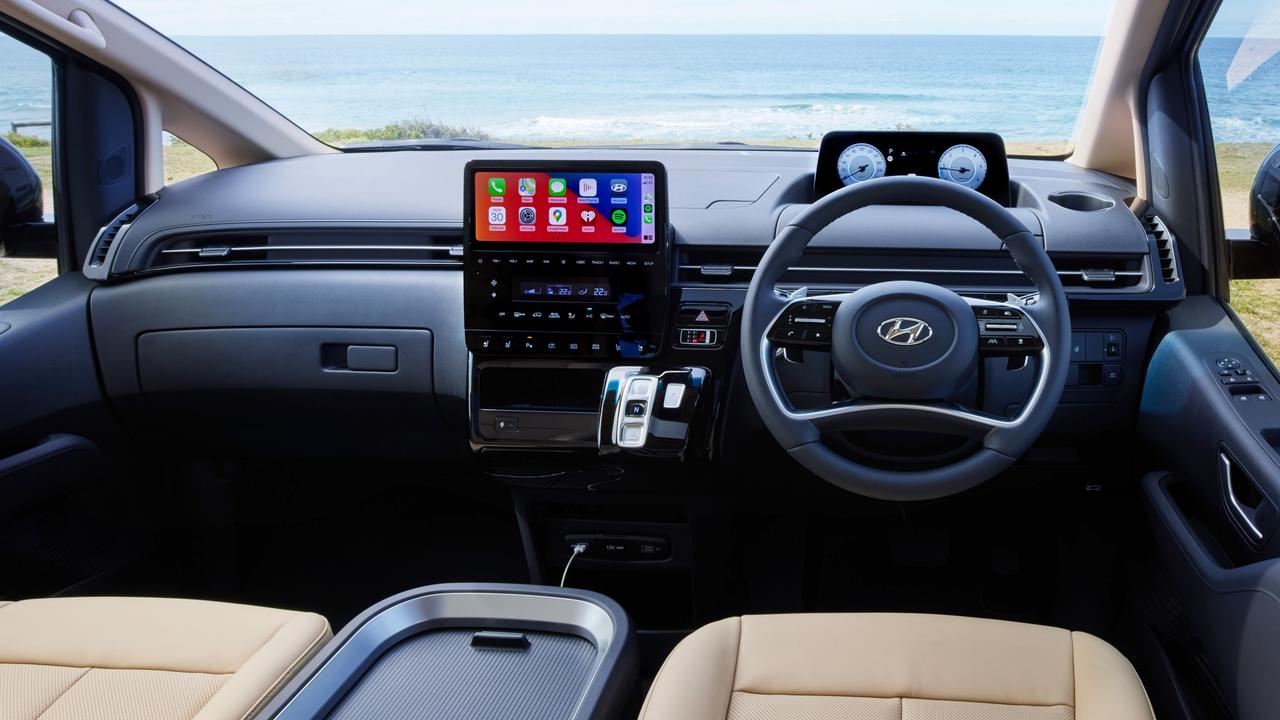 Among the Hyundai Staria Highlander interior highlights are a 10.25-inch central touchscreen that has Apple CarPlay and Android Auto compatibility linked to a six-speaker stereo, wireless phone charging, leather seat trim and a large LCD digital instrument cluster for the driver.