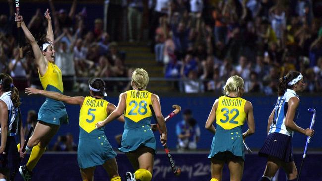 Hockeyroos player Rechelle Hawkes (L) celebrates a goal during their win in the Sydney 2000 final.