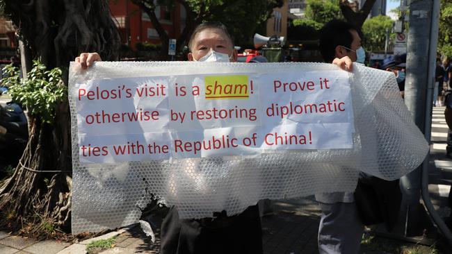 Kaidee Lee, 71, protesting outside of Taiwan's parliament in Taipei on Wednesday. Picture: Rosaline Walters