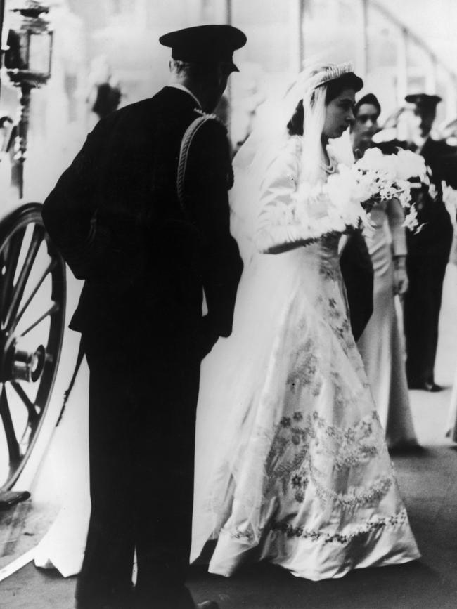 Princess Elizabeth (later Queen Elizabeth II) arrives at Westminster Abbey with her father King George VI, for her marriage to Philip. Picture: Hulton Archive/Getty Images)