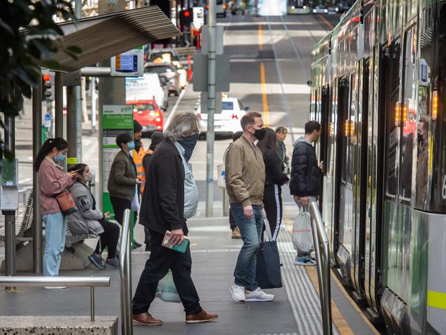 People using public transport in the Bourke Street Mall. Picture: Tony Gough