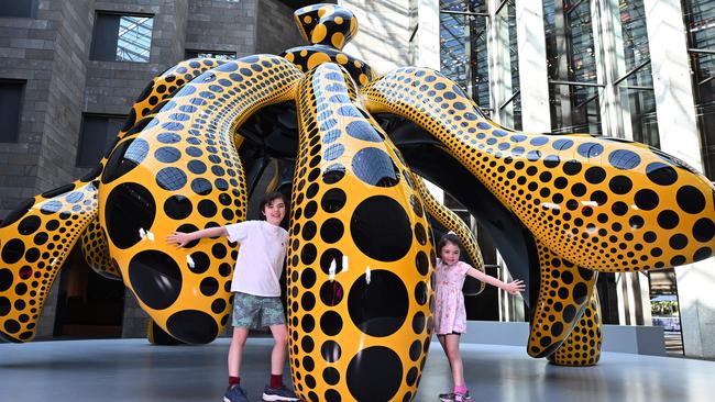 Felix, 10 and Niko, 6 with Yayoi Kusama’s Dancing Pumpkin. Picture: Josie Hayden