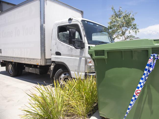 Vans that were allegedly involved remain at the scene at Condell Park warehouse were an alleged kidnapping and assault over illegal tobacco took place.Picture: Jeremy Piper