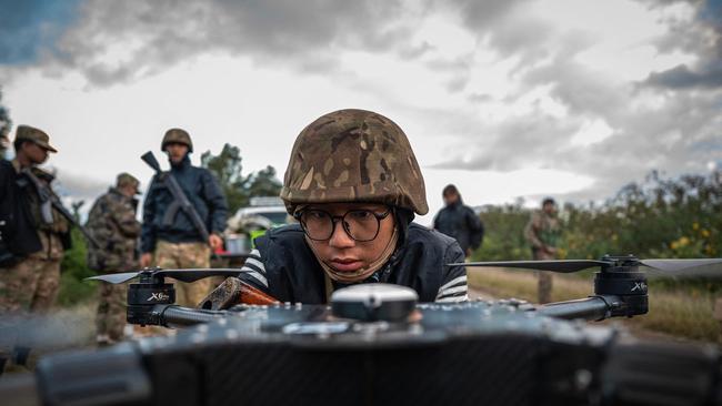 A member of the Mandalay People’s Defense Forces preparing to release a drone near the frontline amid clashes with Myanmar's military in northern Shan State.