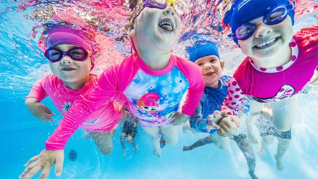 Kids Bianca Willis, Mikayla Atkinson, Isla Tooley and Elenor Smith enjoying their swimming lessons. Picture: Nigel Hallett