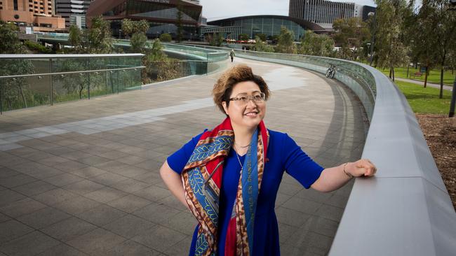 Adelaide-based Chinese entrepreneur Sally Zou on the River Torrens footbridge. Picture: Jo-Anna Robinson