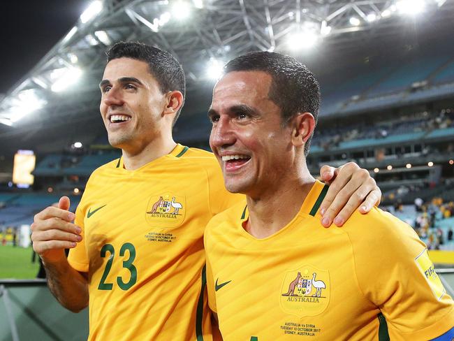 Rogic (L) celebrates with Socceroos teammate Tim Cahill. Pic: Brett Costello