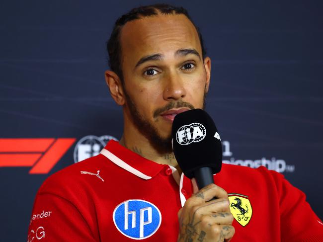 SHANGHAI, CHINA - MARCH 22: Sprint winner Lewis Hamilton of Great Britain and Scuderia Ferrari in the Drivers Press Conference during the Sprint ahead of the F1 Grand Prix of China at Shanghai International Circuit on March 22, 2025 in Shanghai, China. (Photo by Clive Rose/Getty Images)