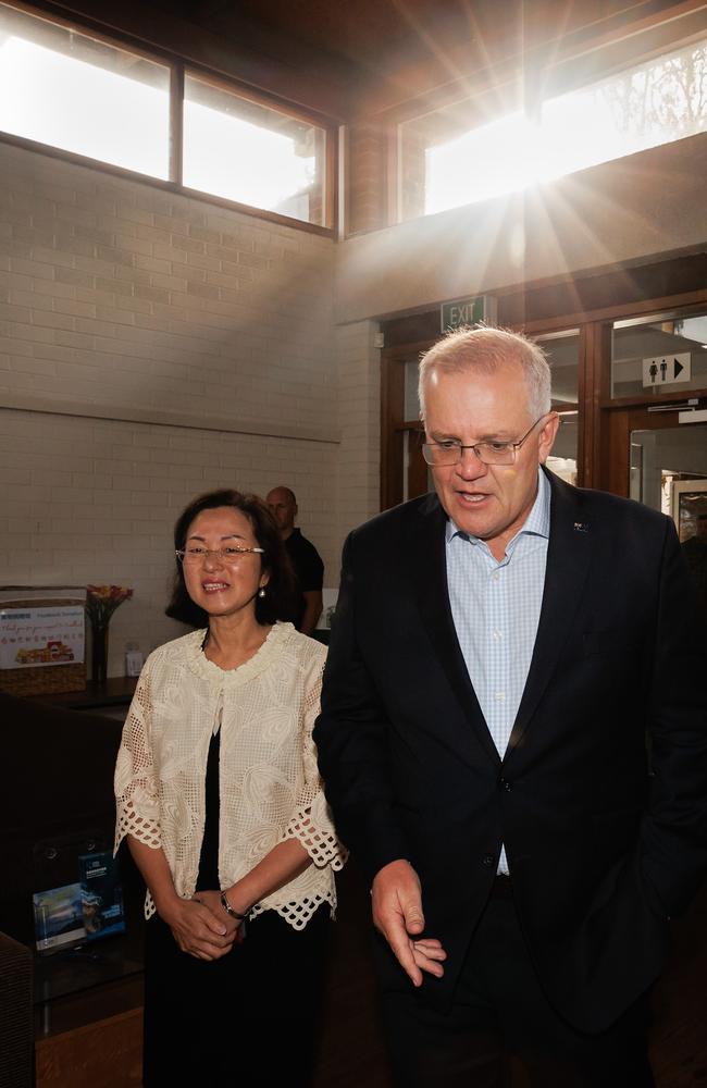 Prime Minister Scott Morrison visits with Gladys Liu. Picture: Jason Edwards