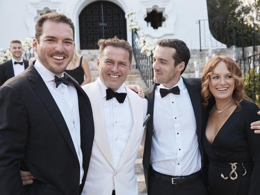 Stefanovic with two of his groomsmen, brothers Pete and Tom, and his sister Elisa.