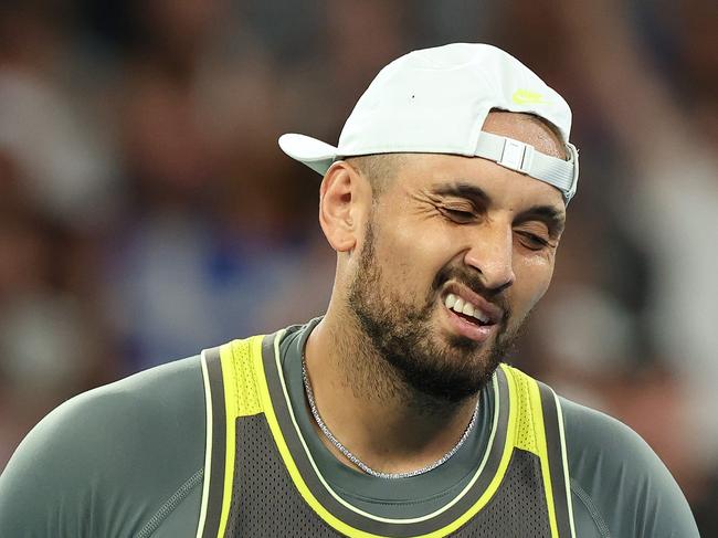 MELBOURNE, AUSTRALIA - JANUARY 13: Nick Kyrgios of Australia reacts against Jacob Fearnley of Great Britain in the Men's Singles First Round match during day two of the 2025 Australian Open at Melbourne Park on January 13, 2025 in Melbourne, Australia. (Photo by Kelly Defina/Getty Images)