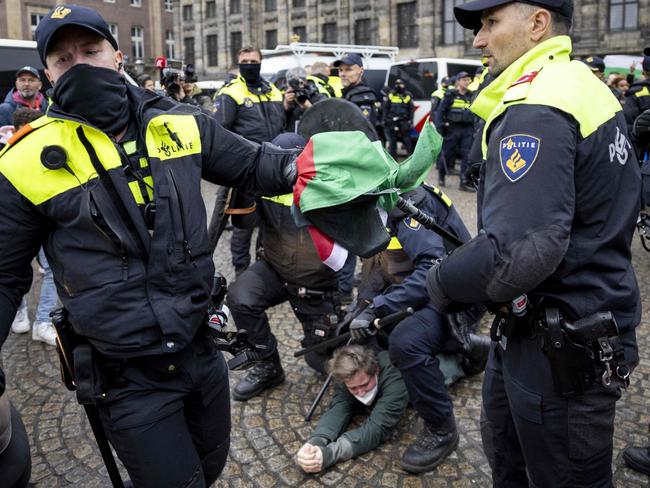 Police clash with protesters following an incident where supporters of Israeli soccer club Maccabi Tel Aviv were attacked in Amsterdam. Picture: AFP