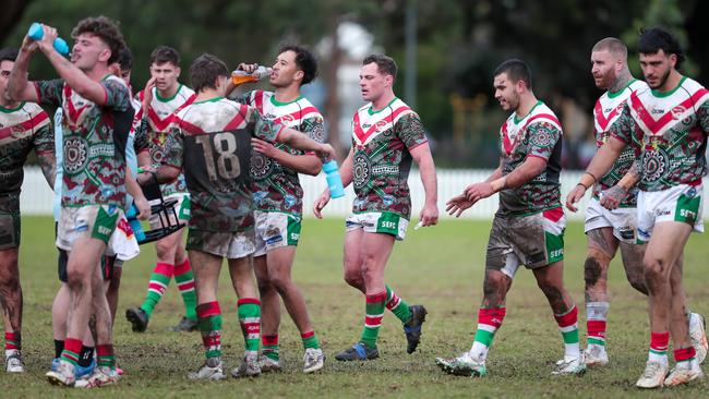 Jackson Garlick and the South Eastern team gather following their third try of the afternoon. Picture: Adam Wrightson Photography