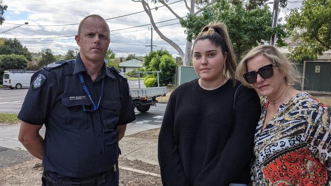 Greensborough highway patrol Sergeant John Henderson with Elleni and Vicki Tzimas. Picture: Kiel Egging