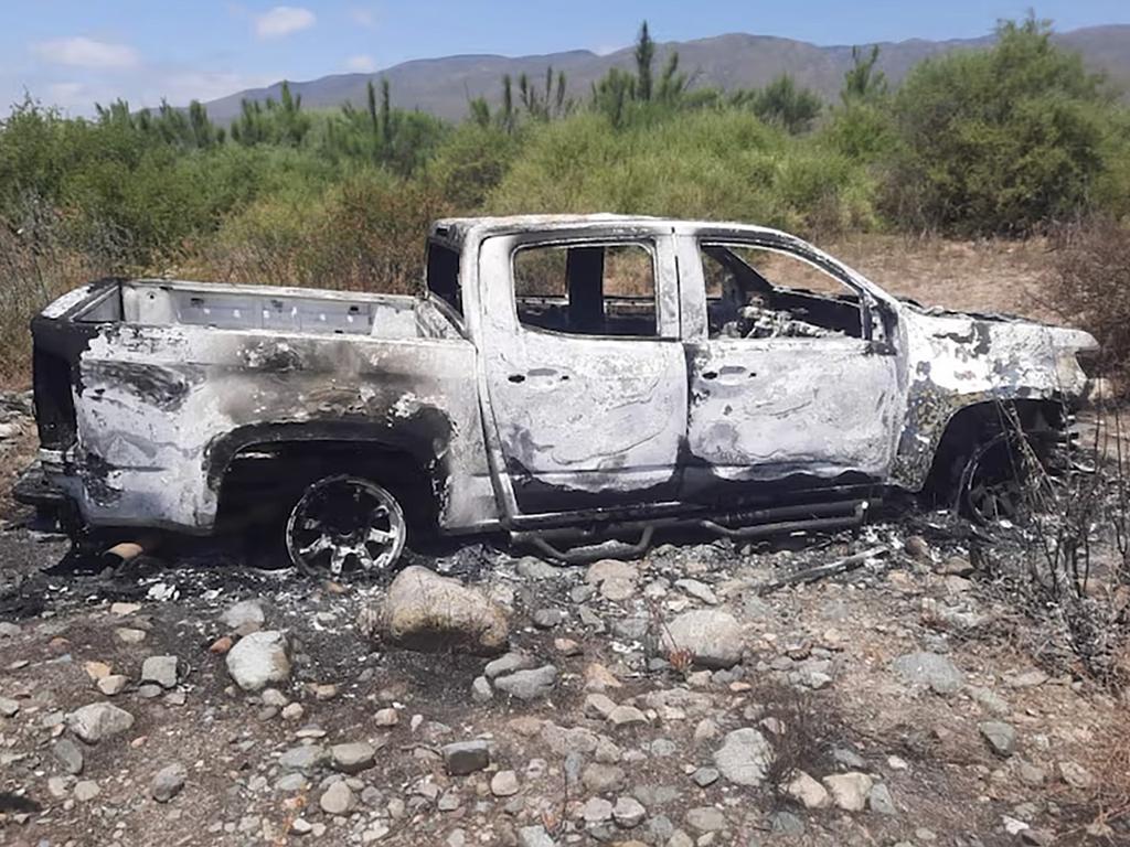 A burnt out car at a ranch several kilometres from the search site. it is believed to have belonged to the missing men. (Supplied)