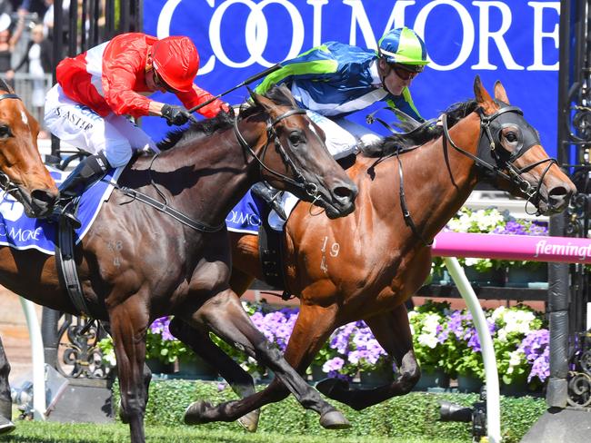 Merchant Navy edges out Invincible Star in the Group 1 Coolmore Stud Stakes.