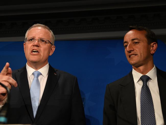 Sharma (right) is focusing on local issues and the economy. AAP Image/Dan Himbrechts)