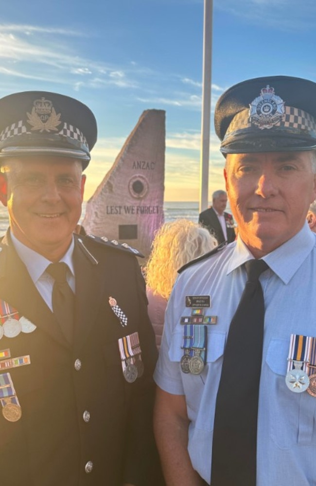 Gold Coast-based police Inspector Jim Munckton (left) at the Anzac Day Dawn Service in Surfers Paradise with Surfers Paradise station boss Senior Sergeant Brad Rix.