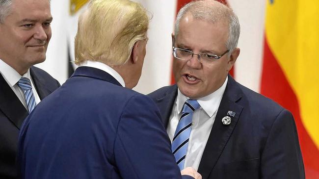 Australia&#39;s Prime Minister Scott Morrison, right, chats with U.S. President Donald Trump. Picture: Kazuhiro Nogi