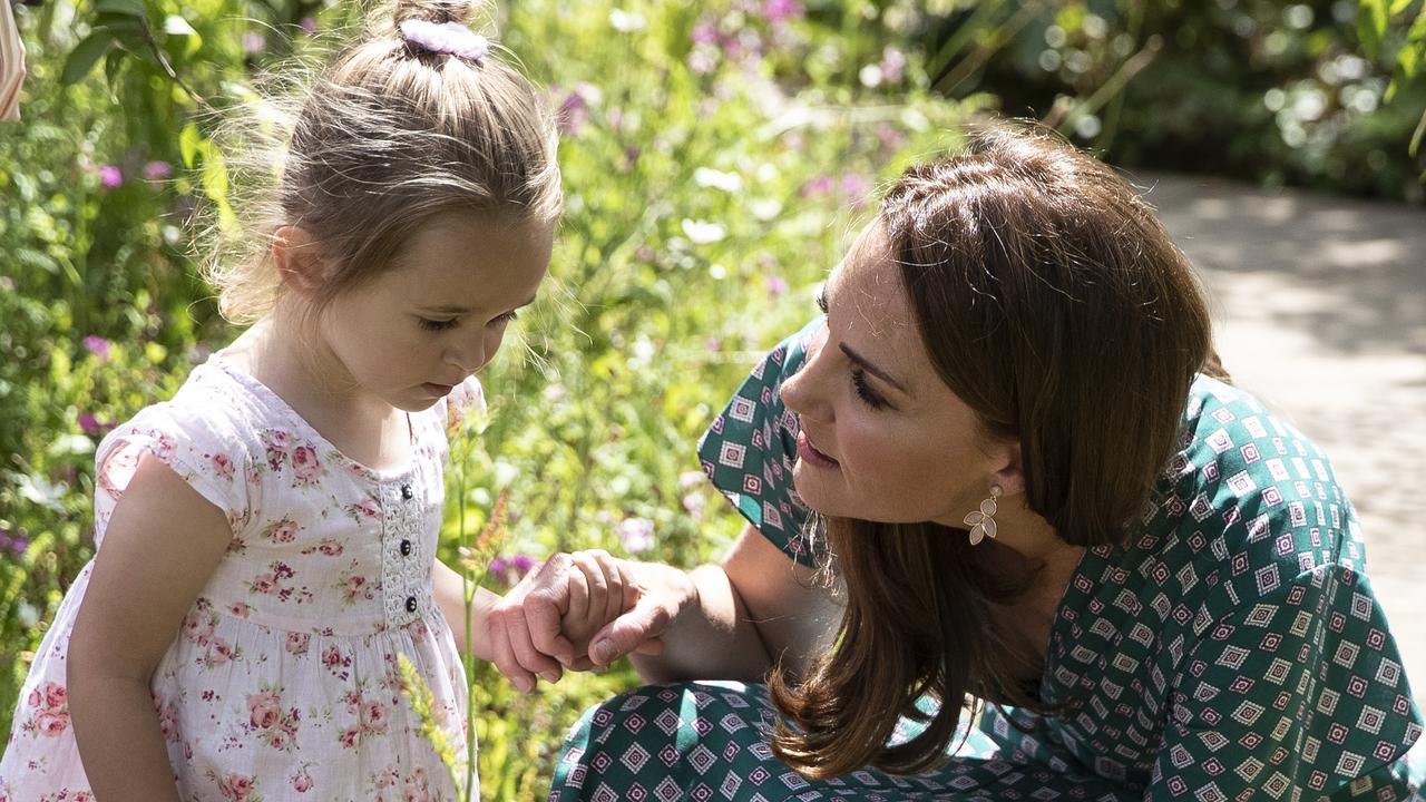 Kate held hands with the young girl throughout the day. Picture: Heathcliff O'Malley — WPA Pool/Getty Images