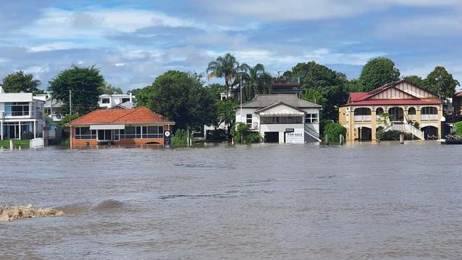 Flooded houses aloing the Brisbane river on Monday. They will need varying degrees of repair. Picture: Picture: VMR 447 – Redland Bay/Facebook