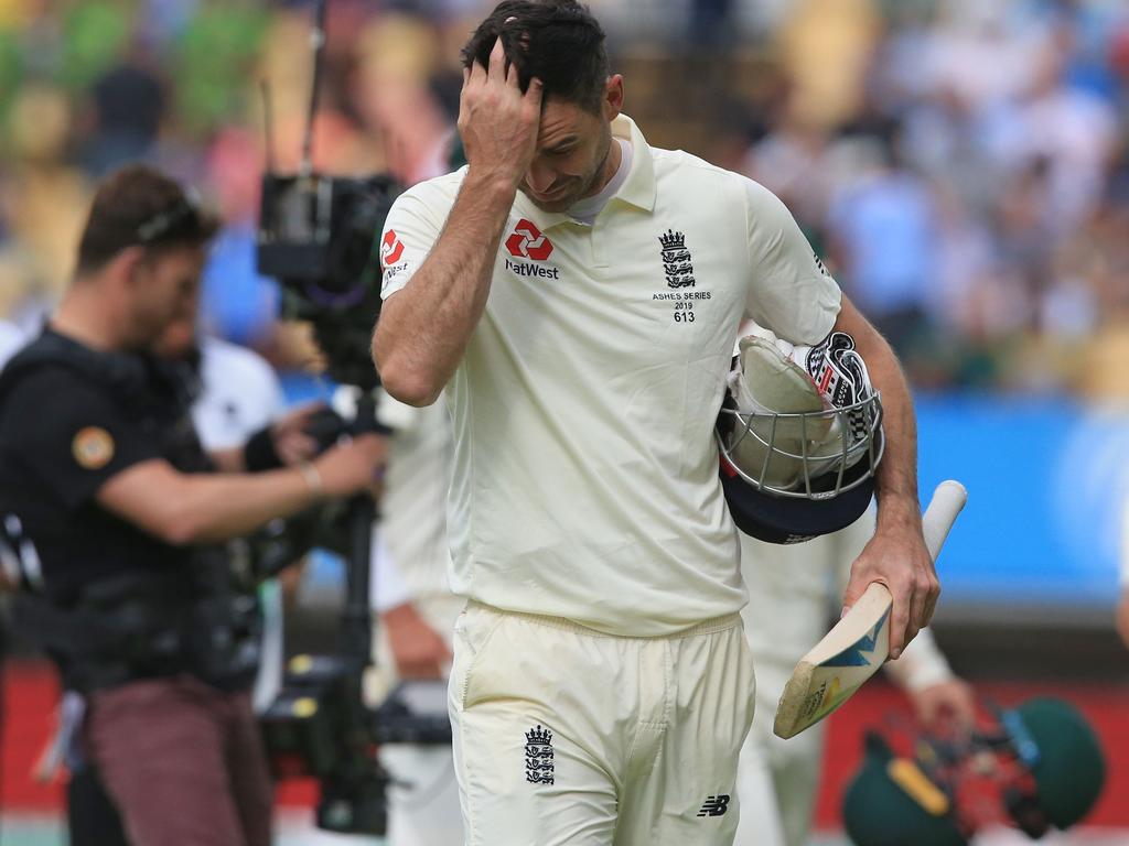 England's James Anderson walks from the field. (Photo by Lindsey Parnaby / AFP)