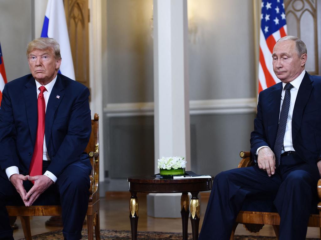 Trump’s connections to Russian President Vladimir Putin, right, have also been the subject of scrutiny. They’re pictured meeting in Helsinki, Finland, in 2018. Picture: Brendan Smialowski/AFP