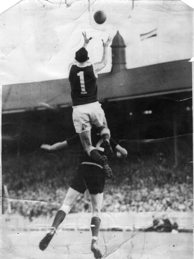 Former Prince Alfred student and champion full-back Ian McKay taking one of the SANFL’s most famous marks — for North Adelaide at Adelaide Oval in the 1952 grand final against Norwood. Picture: Bill Teubner