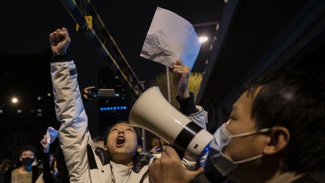 Protesters shout slogans during a protest in Beijing, China. Picture: Getty