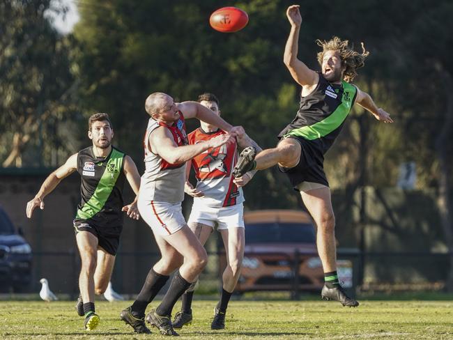 SFL: Doveton’s Travis Woodfield flies high. Picture: Valeriu Campan