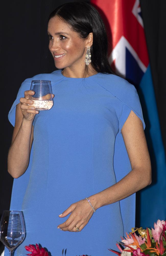 Toasting with sparkling water instead of champagne. Rough. Picture: Ian Vogler/Pool Photo via AP