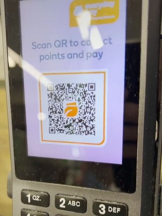 Customers add their card details to the app then scan a QR code on checkout. Picture: TikTok/woolworths_au