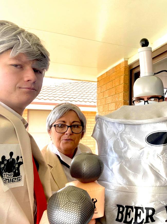 Charlie Mclennan and her sons George and Bill dressed up for their Covid test. Credit: Facebook