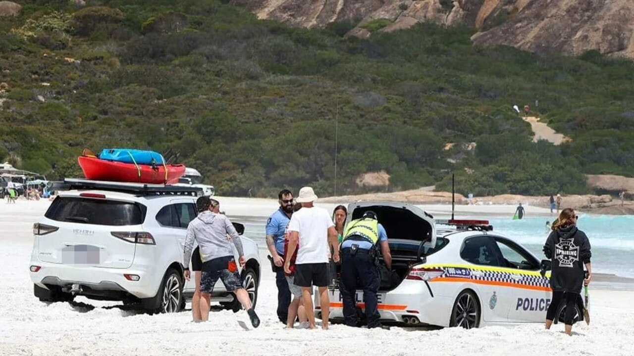 The officers turned to tourists for some help. Picture: Facebook/Bogged