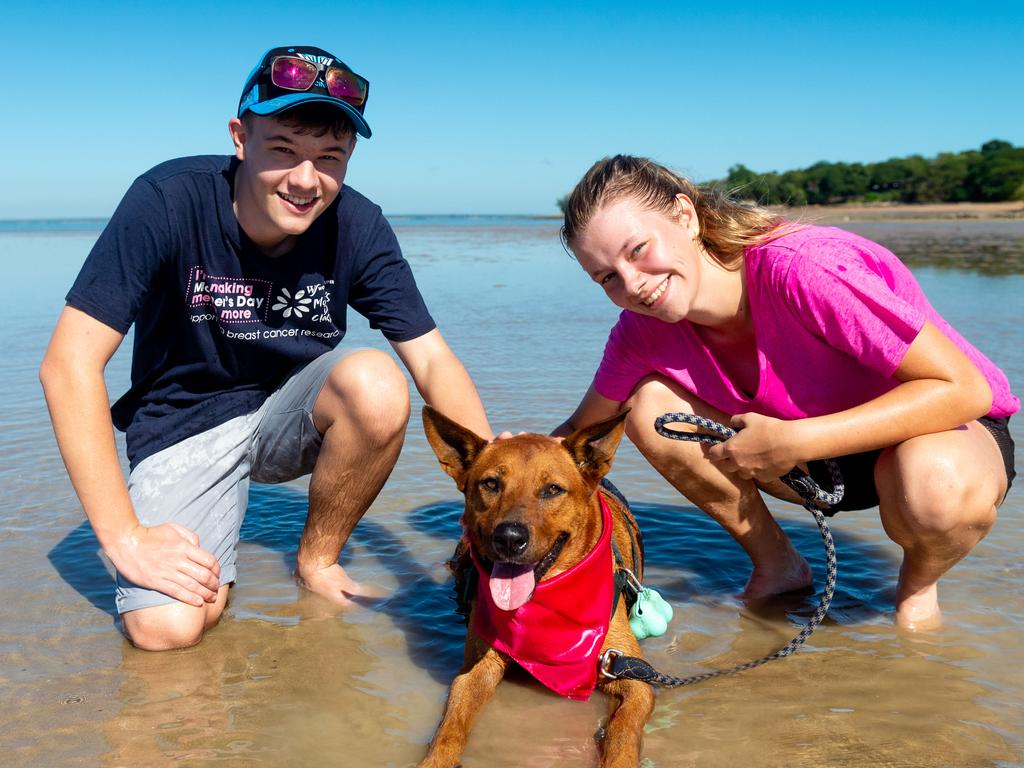 The annual Mother's Day Classic supporting breast cancer research was held along the East Point foreshore in 2021. Jade and Beau Stroud with Skye the dog run on East Point beach. Picture: Che Chorley