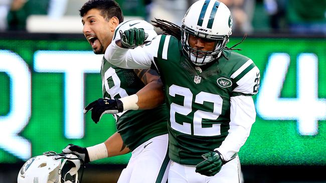 Defensive men Marcus Williams and Jason Babin.