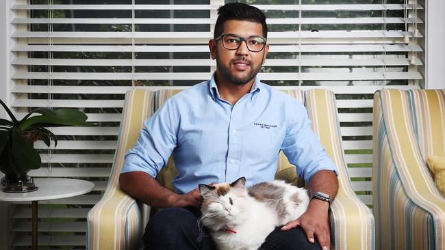 Part-timer Habib Khan and cat Rumi at his mother’s house at Pennant Hills. Picture: John Feder/The Australian