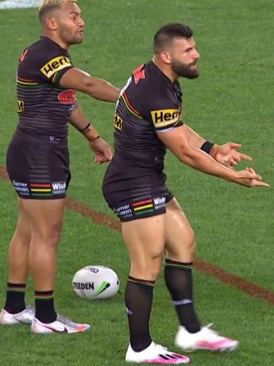 Mansour pleads with the referee after losing the ball.