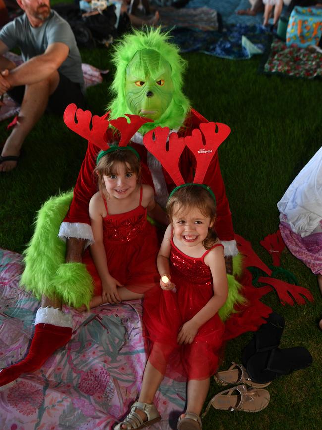 Carols by Candlelight at Riverway 2022. Dale Butterworth with Leah Butterworth, 4, and Zara Perez, 4. Picture: Evan Morgan