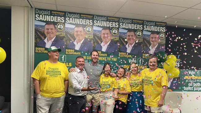 Dugald Saunders with his electoral and ministerial team.