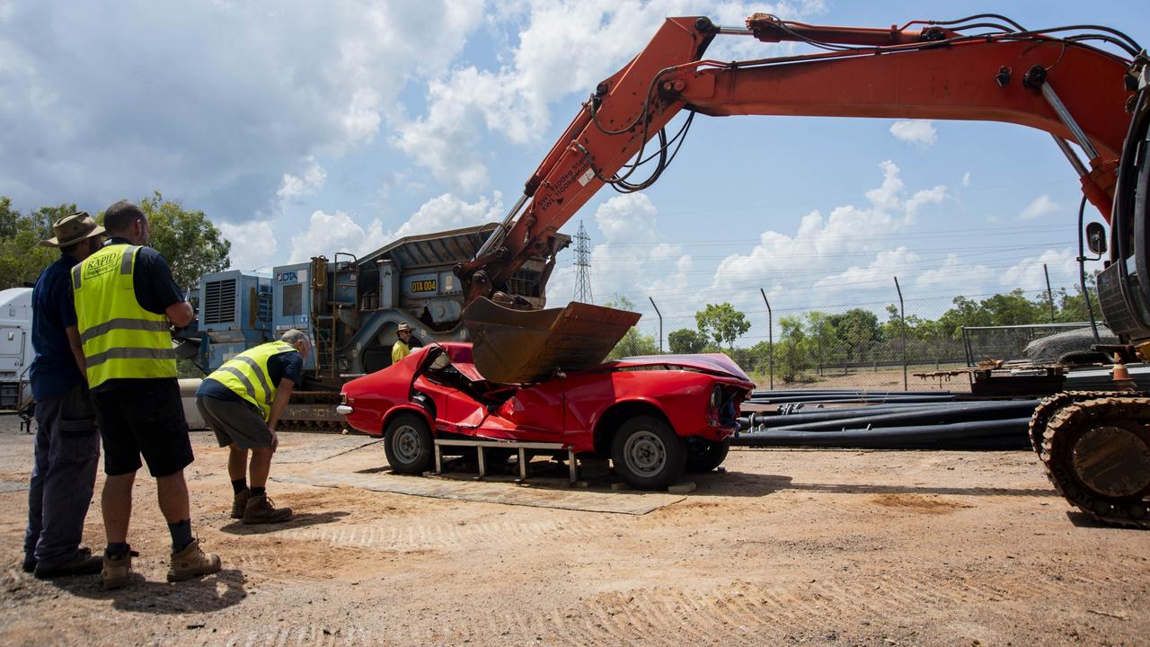 Crushing the replica Holden Torana. Picture: Georgina Campbell/MAGNT