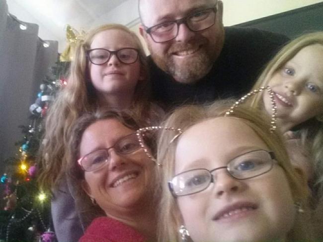 Mathew Werfel, pictured with his wife Jenny and three daughters, Mya (aged 12, back left), Alana, (aged nine, front) and Cadence (aged eight, right). He was diagnosed with the terminal cancer in 2017. Picture: Supplied