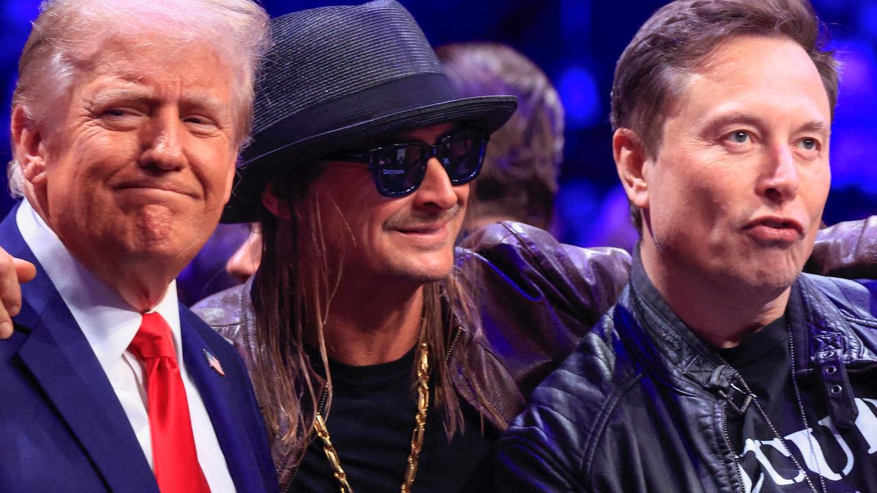 Here we see Mr Musk hard at wo... oh wait, sorry no, he’s at the UFC with Mr Trump and the singer Kid Rock. Picture: Kena Betancur/AFP