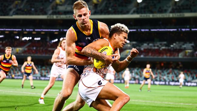 Adelaide’s David Mackay hits Bobby Hill in a tackles as the Crows shocked the Giants at Adelaide Oval Picture: Getty Images