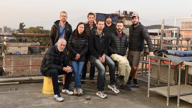 Australians Tony Symons, Paul Ashenden, Jody Hutton, Ryan Cox, Brook Hutton, Jonathon Creasey, Anthony Keane and Brad Fleet on top of Kathmandu Guest House. Picture: Brad Fleet