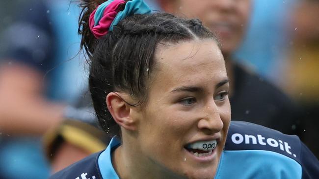 SYDNEY, AUSTRALIA - MARCH 14: Maya Stewart of the Waratahs scores a try during the round five SuperW Rugby match between New South Wales and Rugby Western Australia at Sydney University on March 14, 2020 in Sydney, Australia. (Photo by Tony Feder/Getty Images)