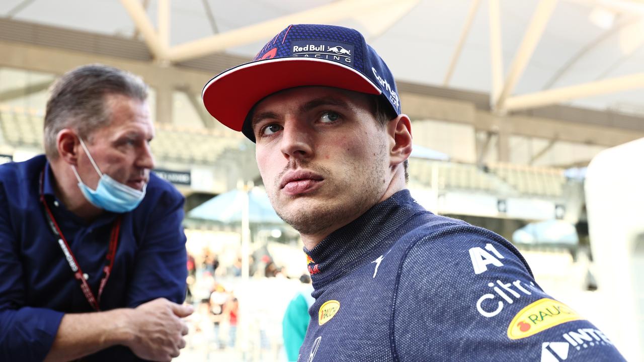 ABU DHABI, UNITED ARAB EMIRATES - DECEMBER 09: Max Verstappen of Netherlands and Red Bull Racing talks with his father Jos Verstappen in the Pitlane during previews ahead of the F1 Grand Prix of Abu Dhabi at Yas Marina Circuit on December 09, 2021 in Abu Dhabi, United Arab Emirates. (Photo by Mark Thompson/Getty Images)