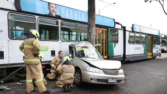 Emergency crews working to clear the wreckage. Picture: David Caird