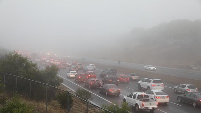 Foggy conditions on the Southern Expressway made driving hazardous in Monday morning. Picture: Dean Martin